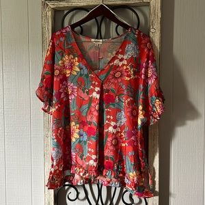 Umgee, size large, floral top with ruffle sleeve detail.